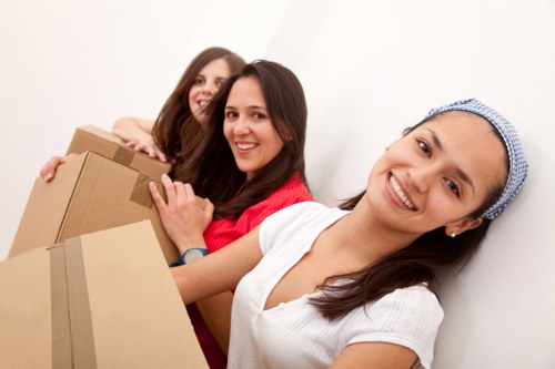 Packed moving boxes and furniture prepared for removal in Nottinghill