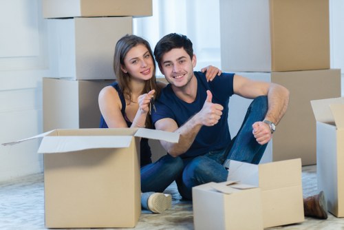 Professional movers loading furniture for a small move in Nottinghill
